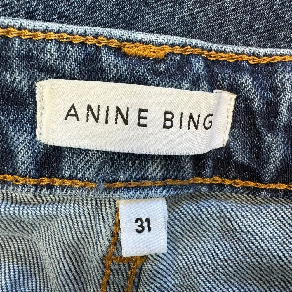 ANINE BING woman's size 31 Lara mid rise indigo raw hem ankle button fly jeans
